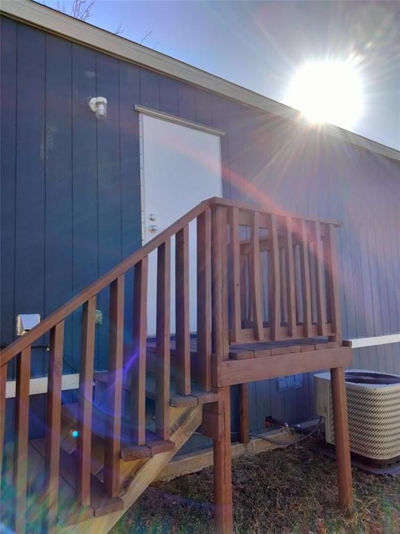 709 North Collins Freeway, Unit 70 Howe, TX 75459 - Photo 5 of 15 a view of a wooden fence