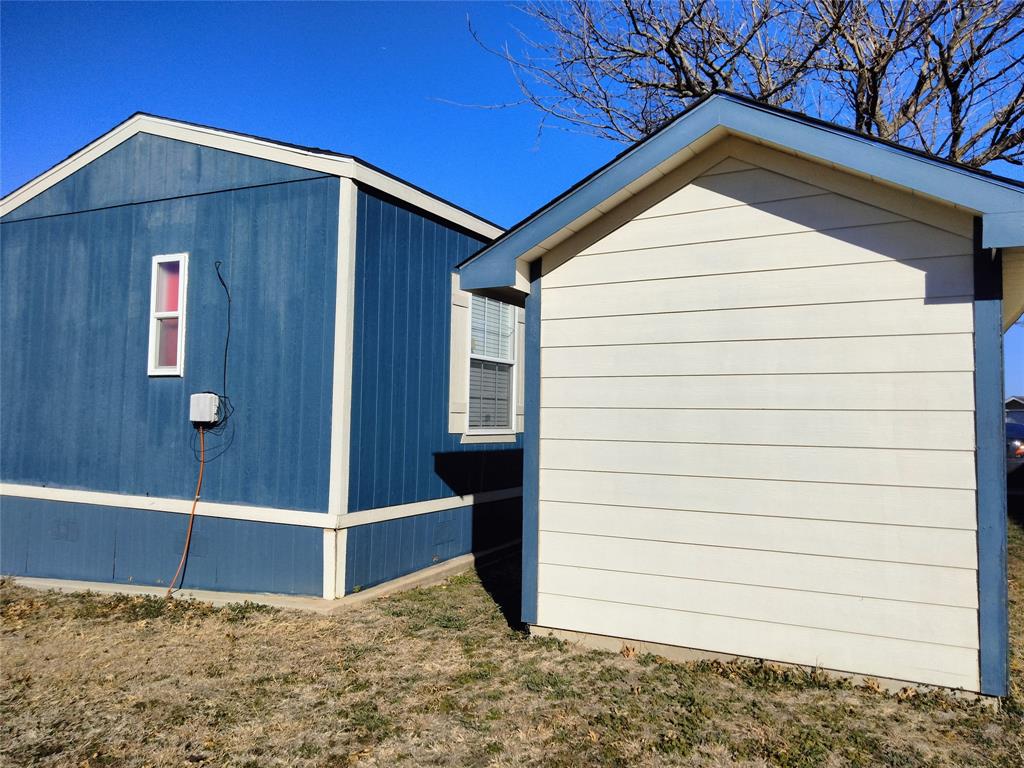 709 North Collins Freeway, Unit 70 Howe, TX 75459 - Photo 7 of 15 a view of small house with a door