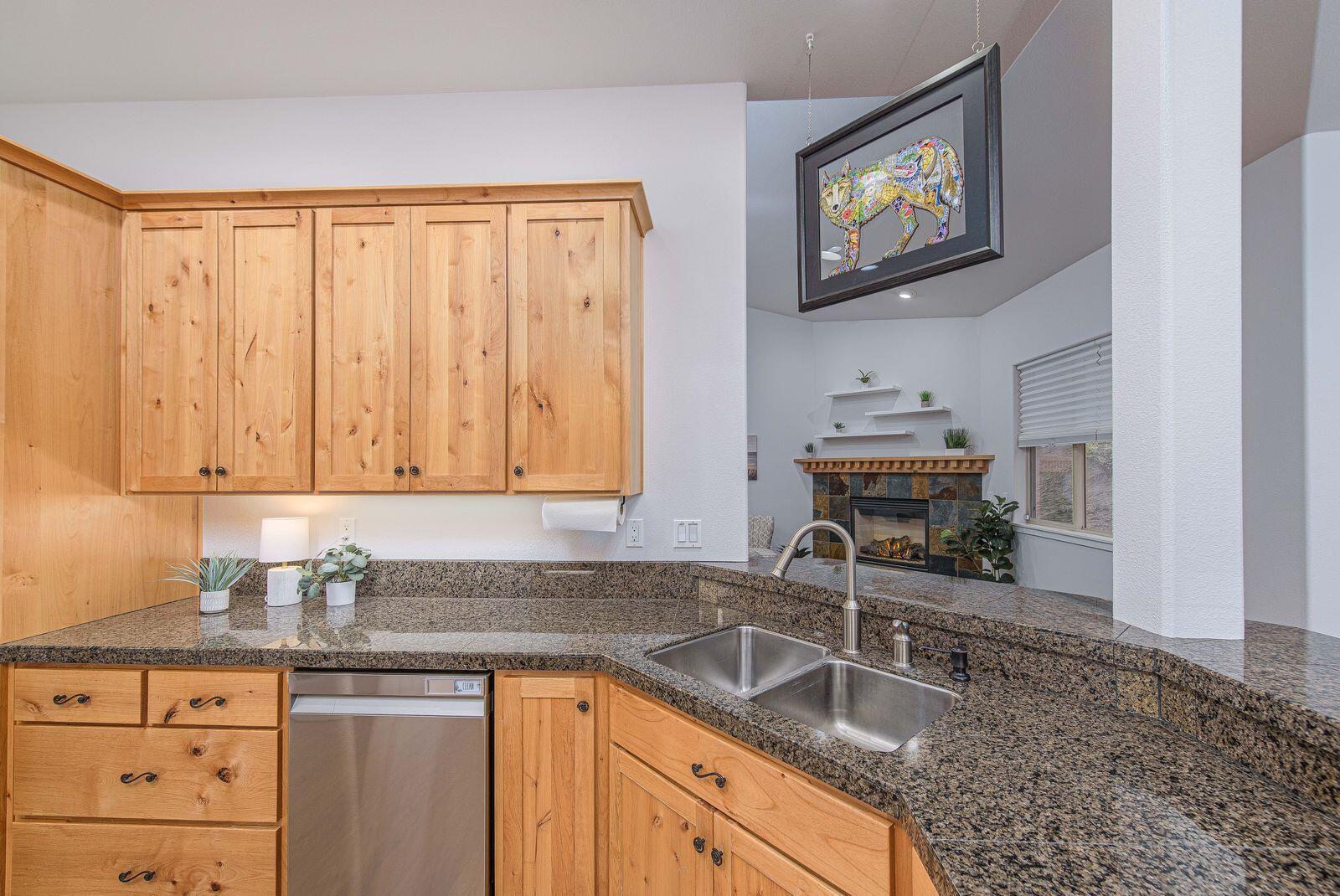 19442 Chip Shot Lane Bend, OR 97702 - Photo 15 of 47 Lots of cabinetry and a corner pantry in the kitchen provides ample storage