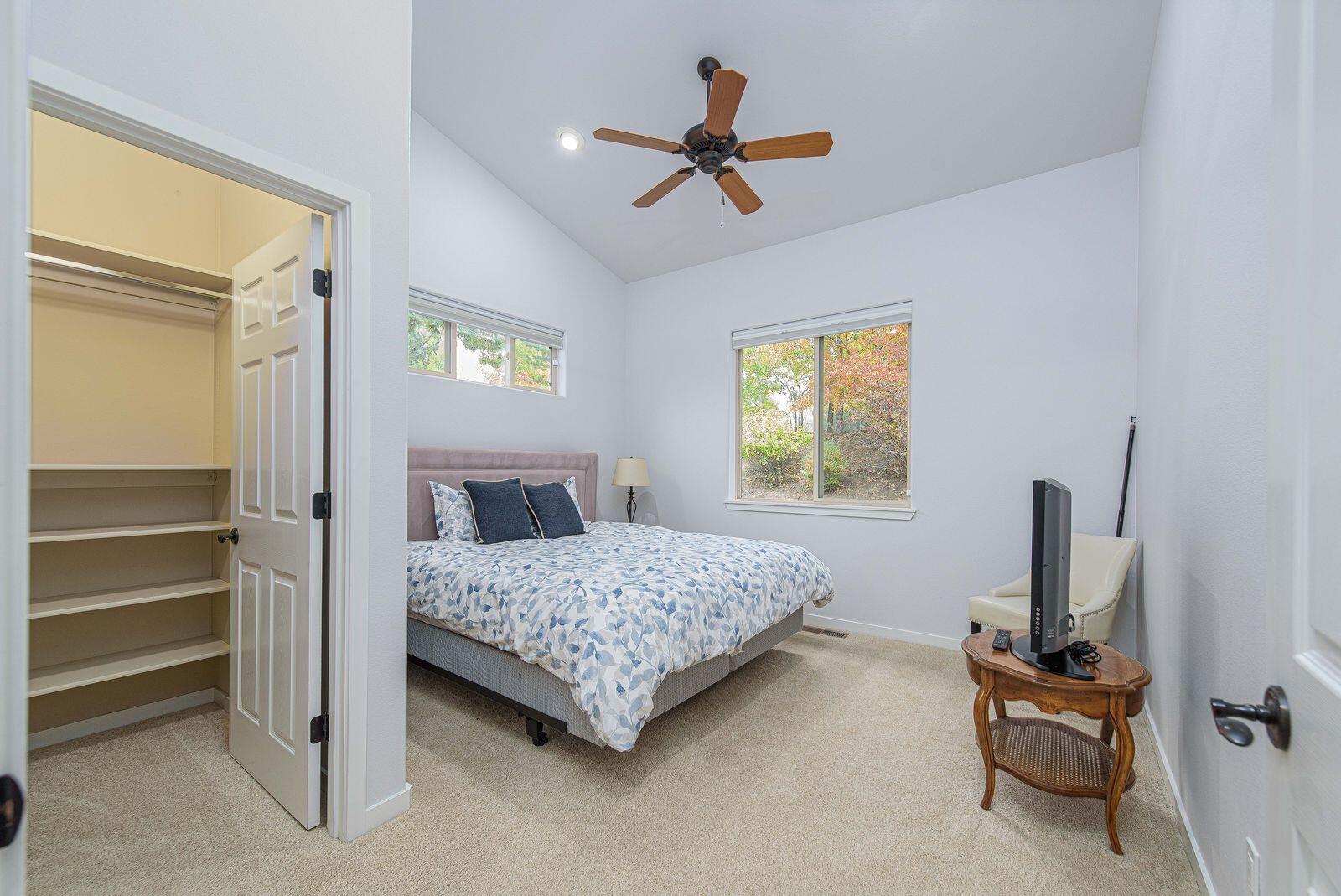 19442 Chip Shot Lane Bend, OR 97702 - Photo 24 of 47 Second ensuite bedroom on the main level with a walk in closet