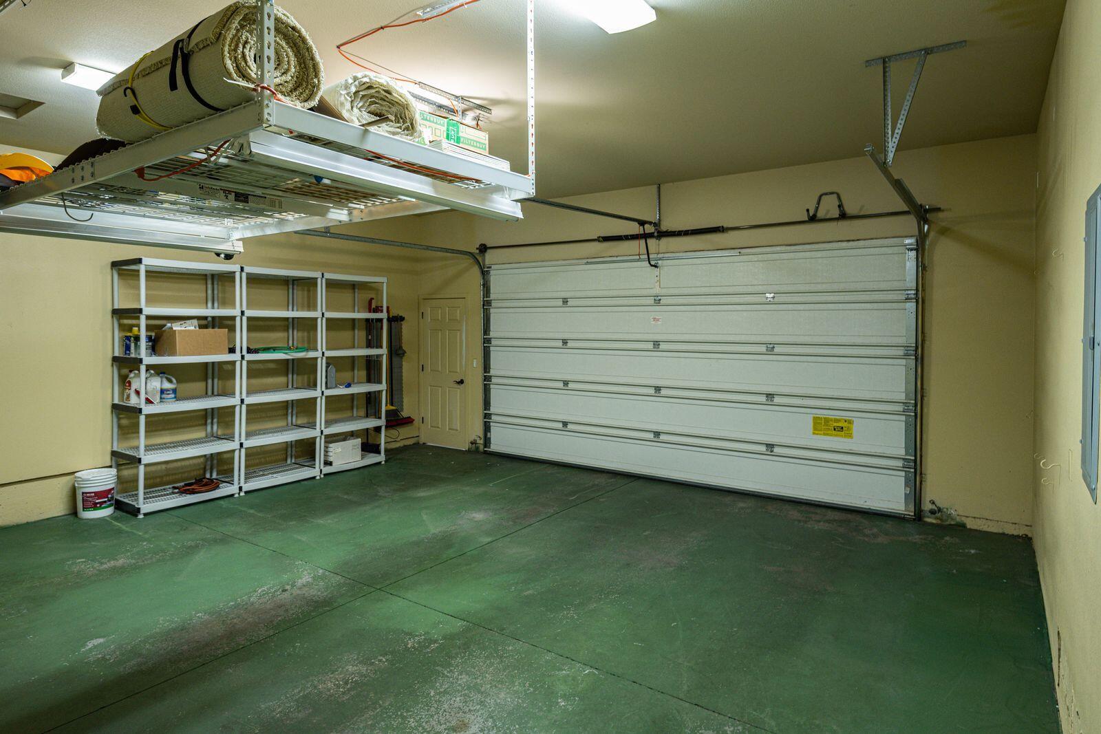 19442 Chip Shot Lane Bend, OR 97702 - Photo 34 of 47 Storage units along the wall are also included in the sale.