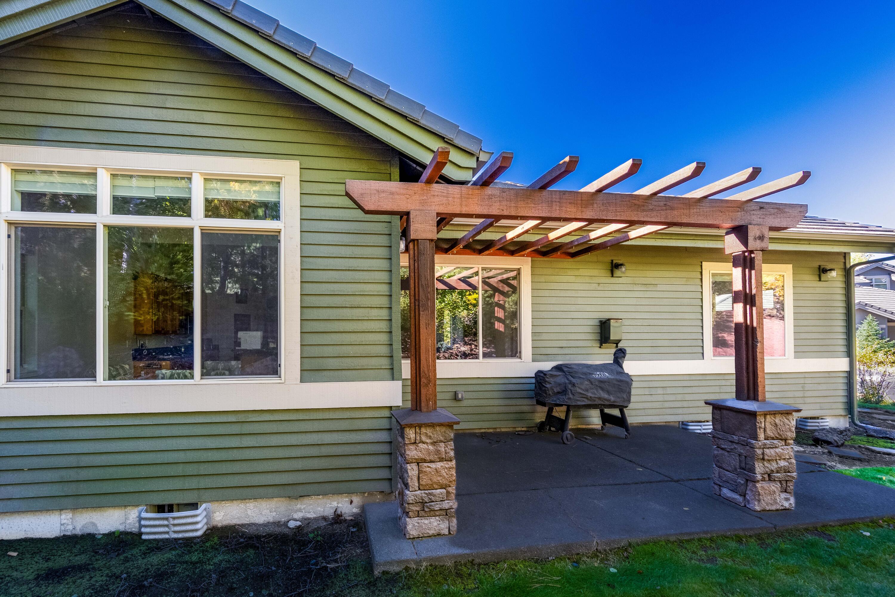 19442 Chip Shot Lane Bend, OR 97702 - Photo 40 of 47 Patio off the kitchen and dining room is a perfect place for your BBQ