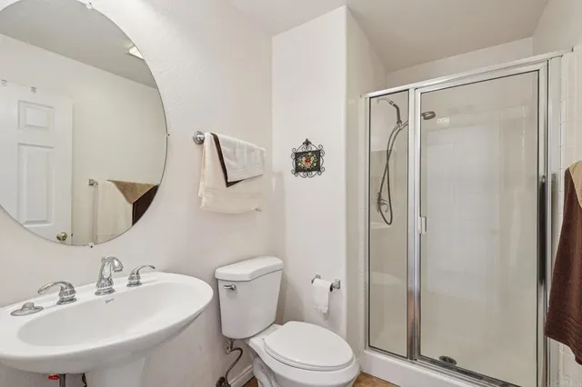 a bedroom with a bed and a closet