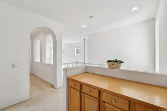 a view of balcony with furniture