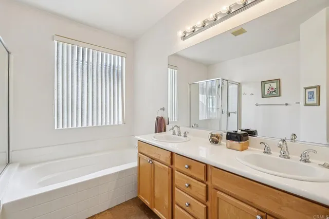 a bedroom with a bed and a large dresser