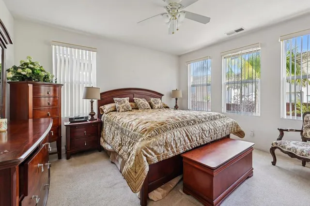 a view of backyard with a patio