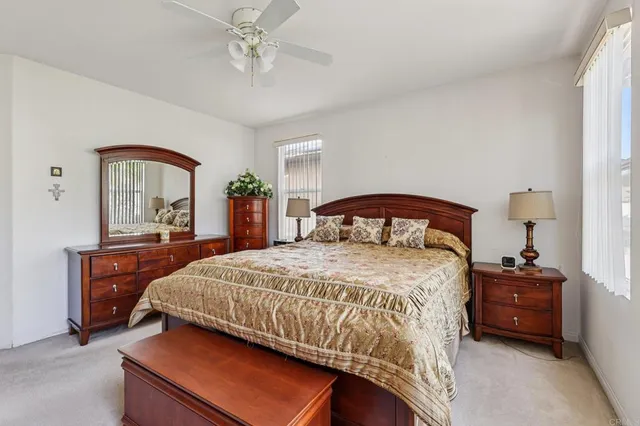 a view of a chairs and tables in the backyard