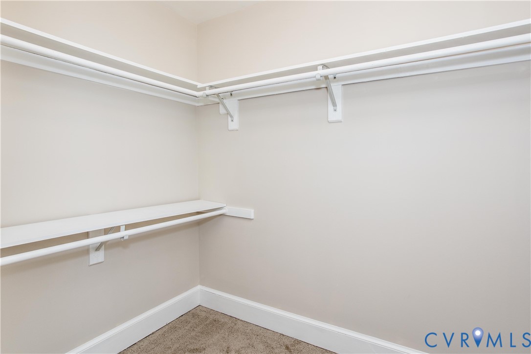 13110 Hensley Road Midlothian, VA 23112 - Photo 20 of 24 a view of a room with racks on the wall