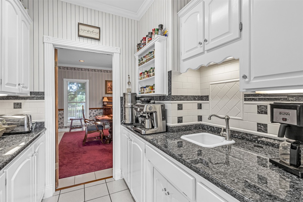 10299 Paddy Hamilton Road Belton, TX 76513 - Photo 15 of 39 a kitchen with sink and cabinets