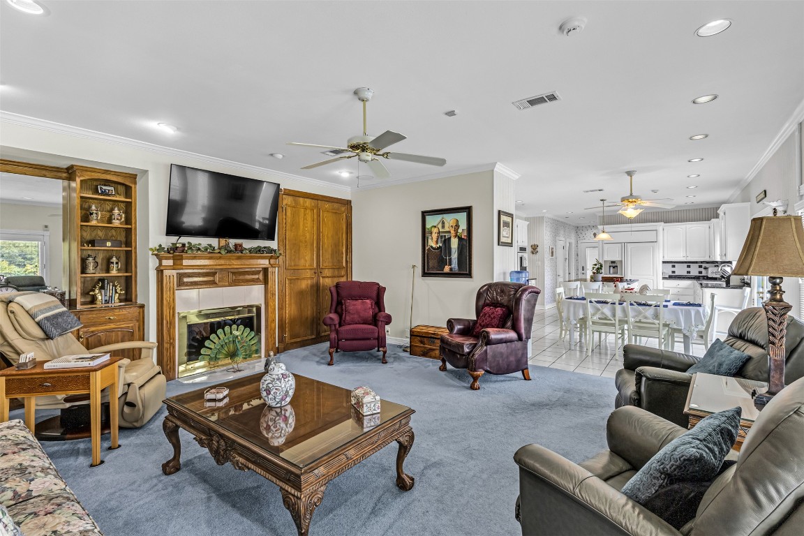 10299 Paddy Hamilton Road Belton, TX 76513 - Photo 21 of 39 a living room with furniture fireplace and flat screen tv