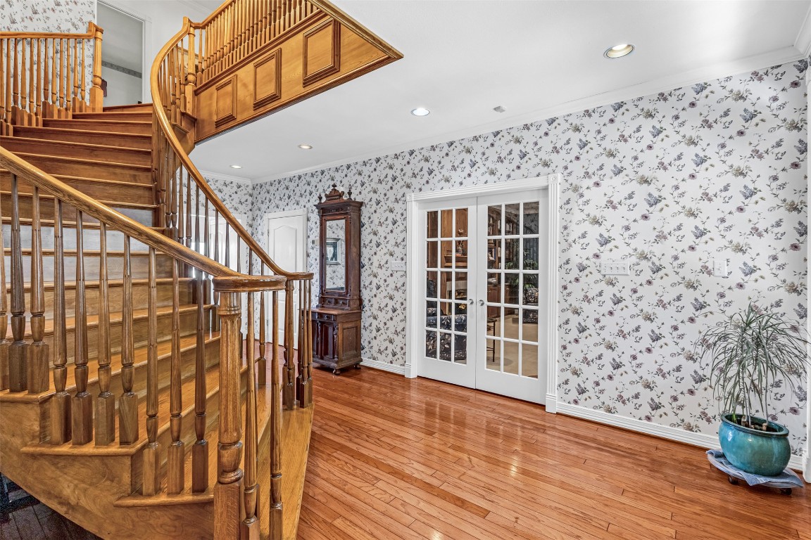 10299 Paddy Hamilton Road Belton, TX 76513 - Photo 23 of 39 a view of front door with wooden floor and stairs