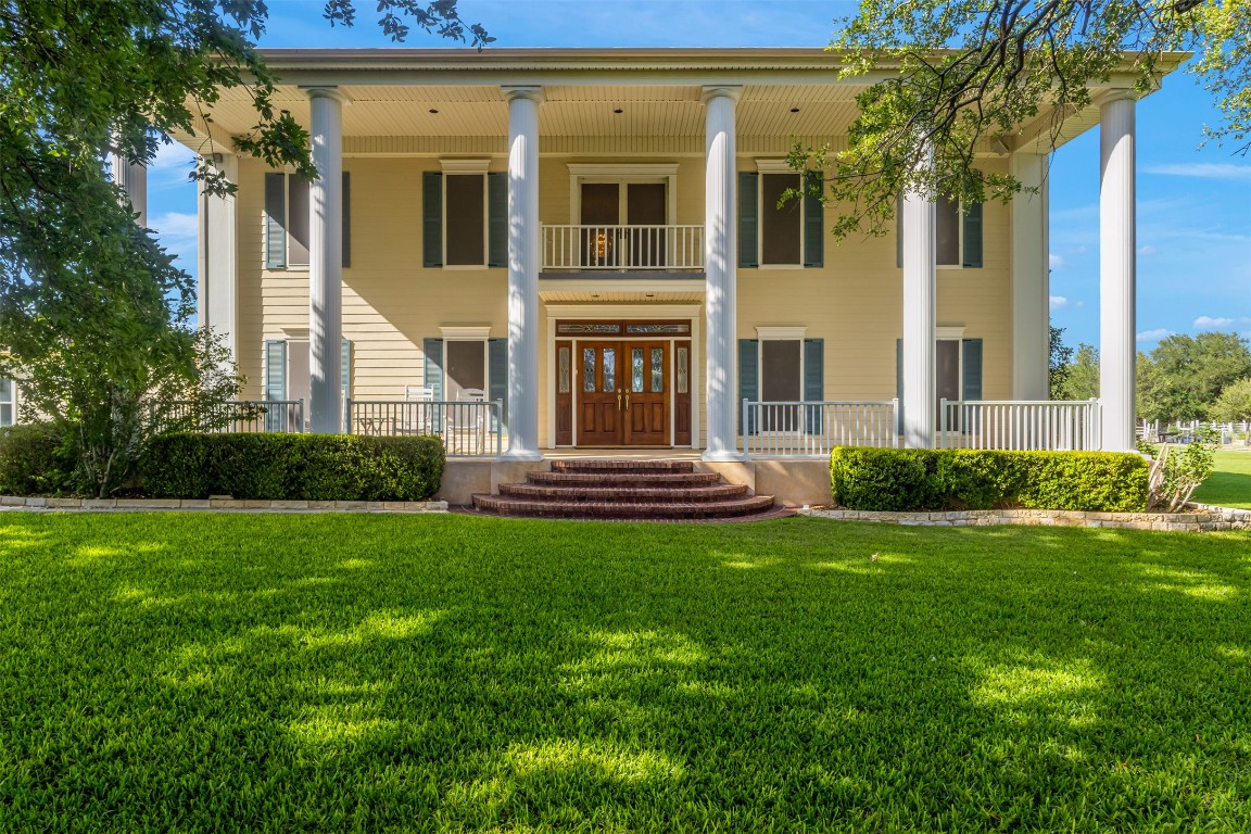 10299 Paddy Hamilton Road Belton, TX 76513 - Photo 9 of 39 a view of a house with a garden and pathway