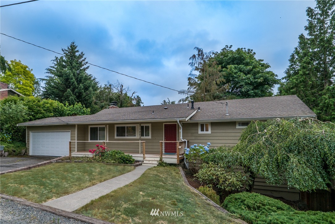 10215 Northeast 198th Street Bothell, WA 98011 - Photo 1 of 25 front view of a house with a yard