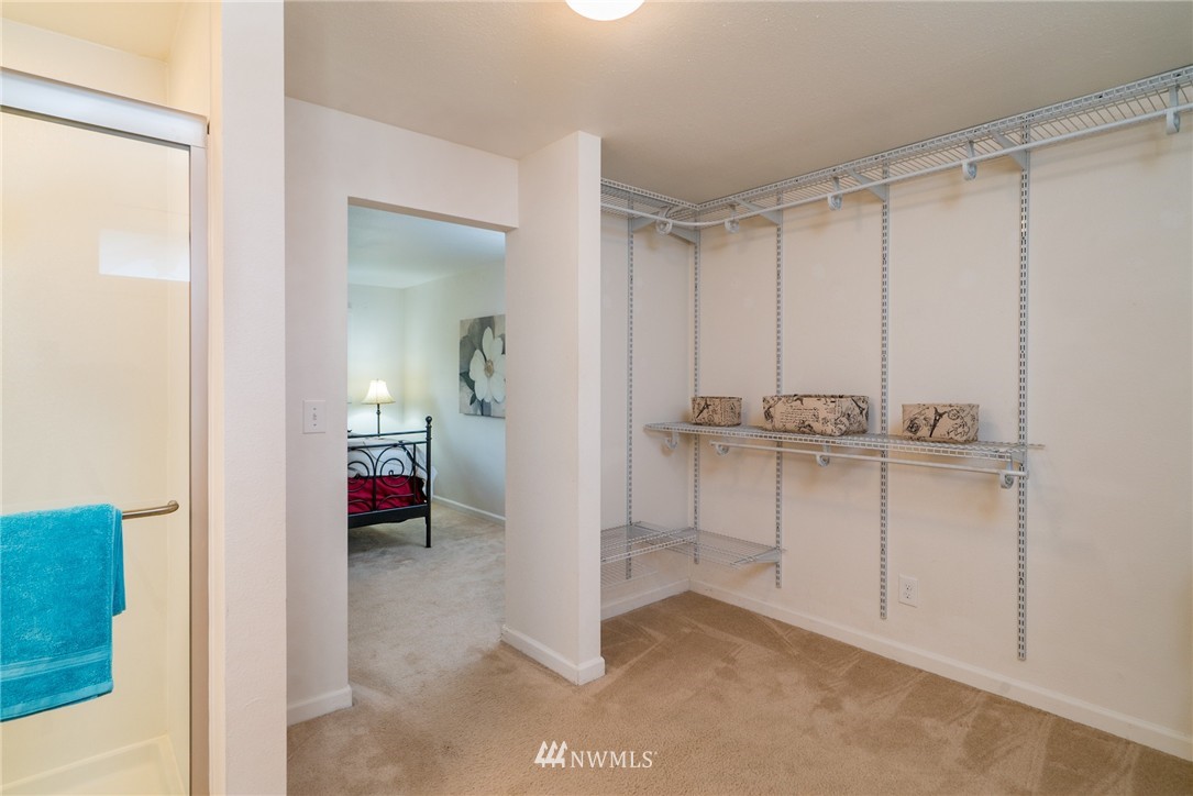 10215 Northeast 198th Street Bothell, WA 98011 - Photo 13 of 25 a view of a bathroom with sink and mirror