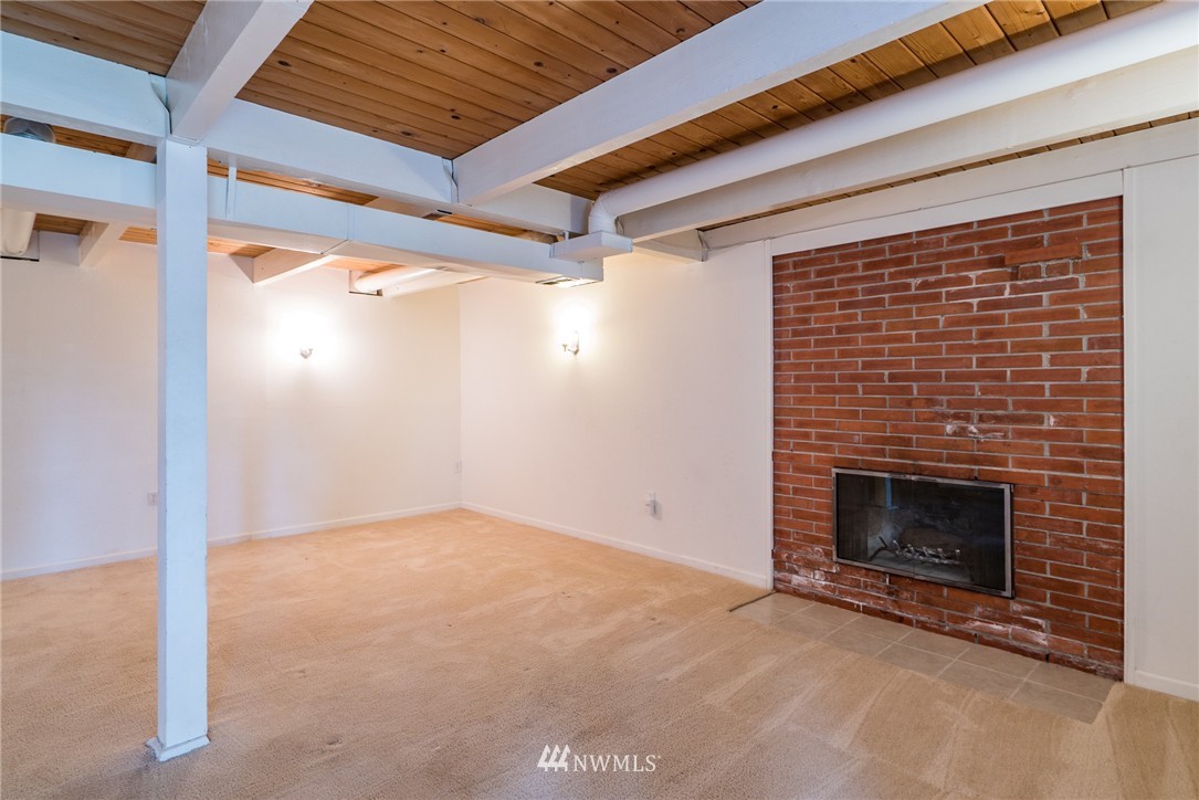 10215 Northeast 198th Street Bothell, WA 98011 - Photo 18 of 25 a view of empty room with fireplace
