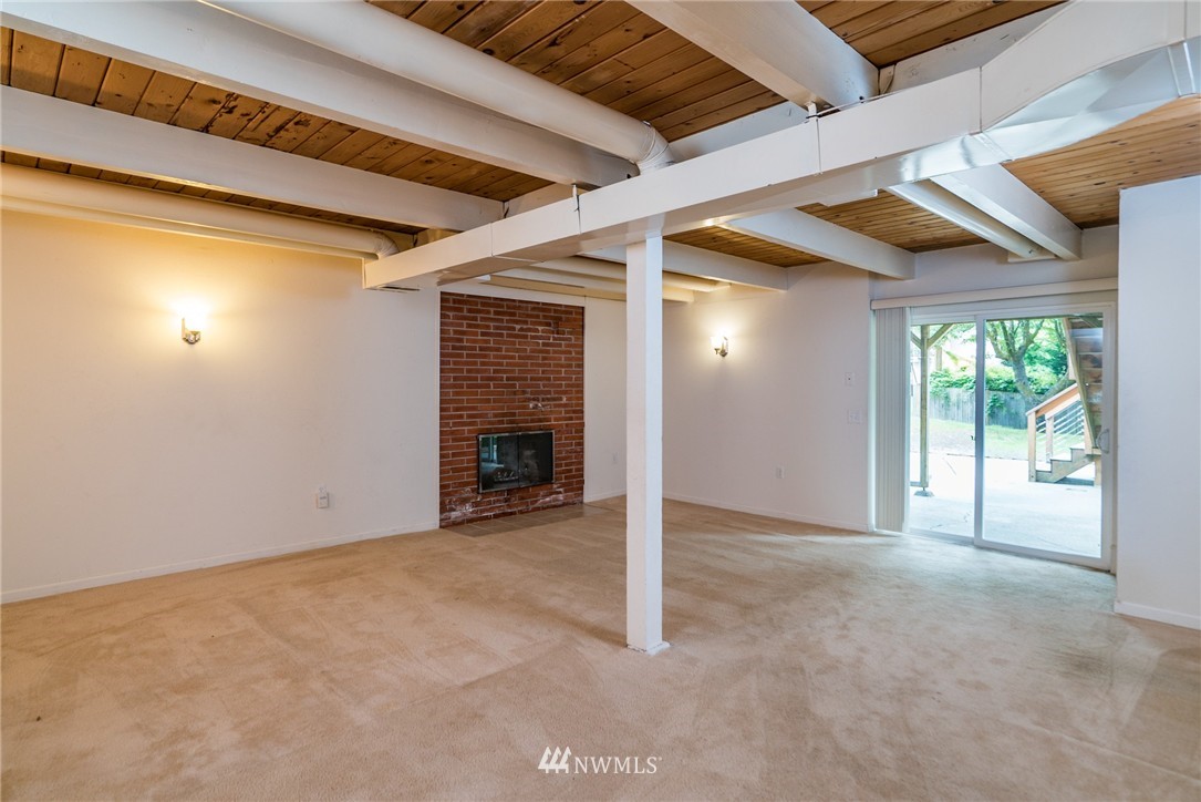 10215 Northeast 198th Street Bothell, WA 98011 - Photo 19 of 25 an empty room with windows