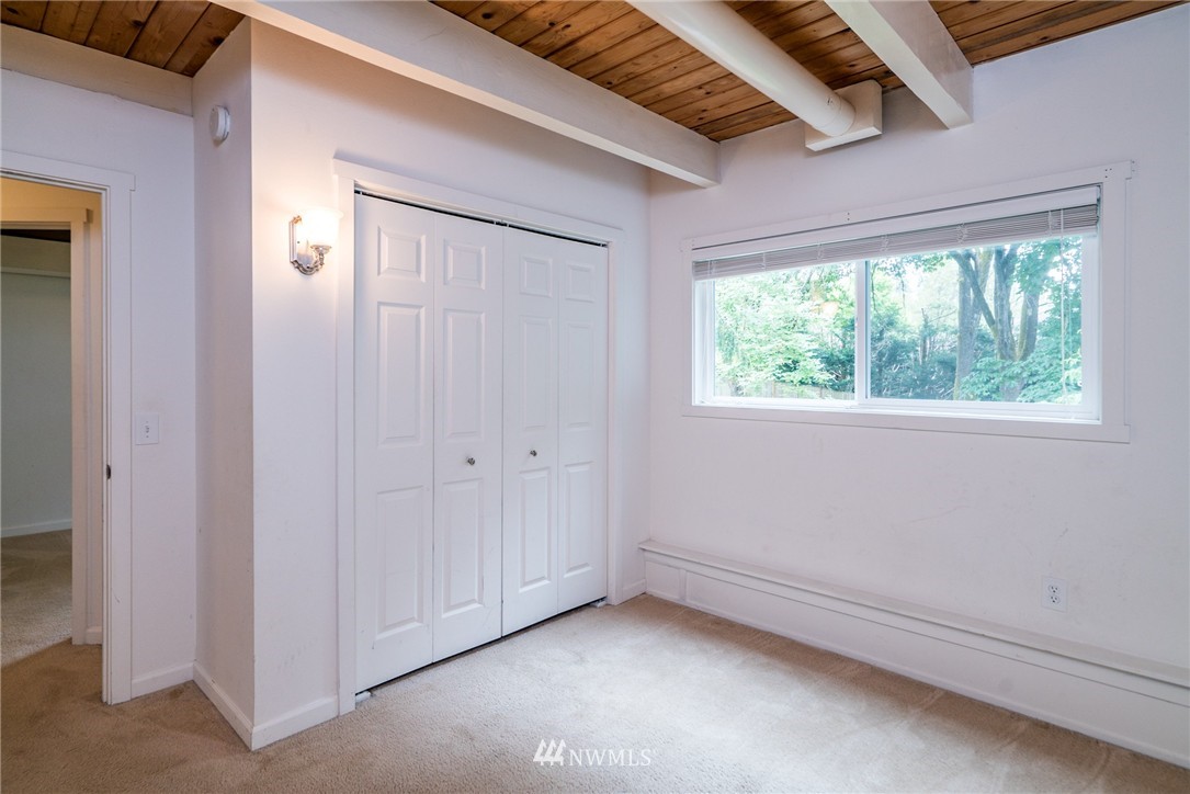 10215 Northeast 198th Street Bothell, WA 98011 - Photo 20 of 25 a view of an empty room with a window