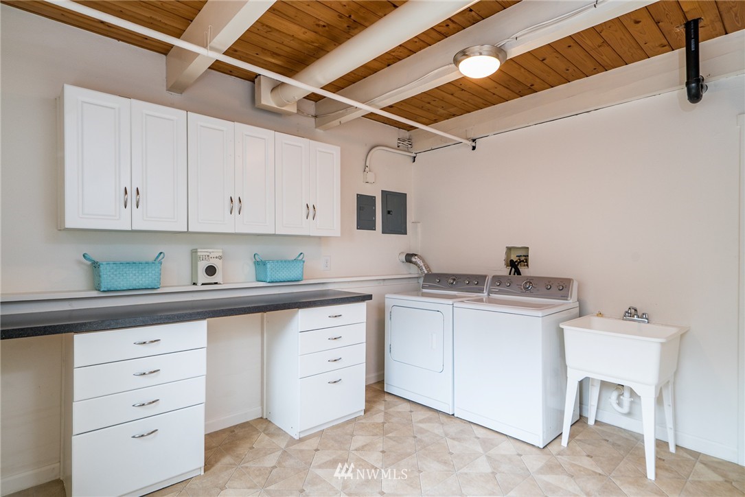 10215 Northeast 198th Street Bothell, WA 98011 - Photo 22 of 25 a kitchen with a sink and cabinets