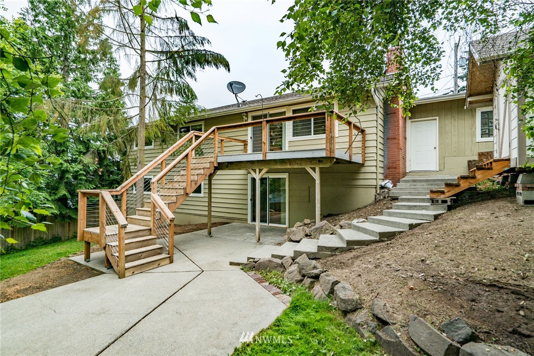 10215 Northeast 198th Street Bothell, WA 98011 - Photo 23 of 25 a front view of a house with garden