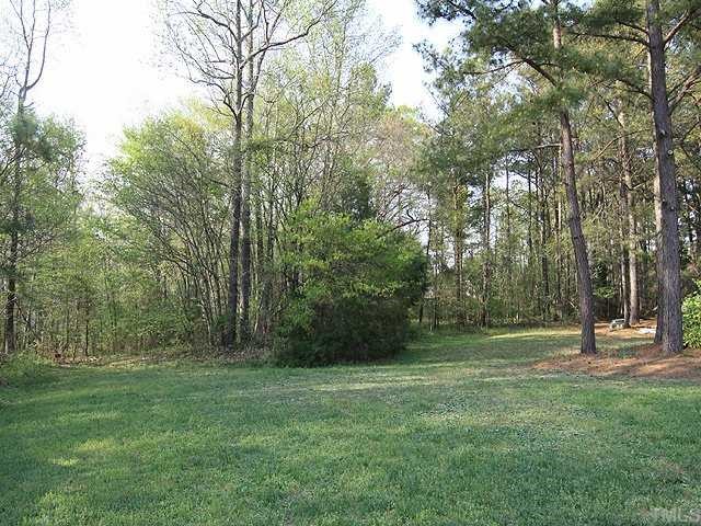 4125 Timberbrook Drive Raleigh, NC 27616 - Photo 11 of 12 a view of outdoor space with trees all around