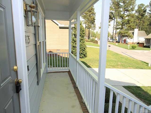 4125 Timberbrook Drive Raleigh, NC 27616 - Photo 2 of 12 a view of a balcony with wooden floor