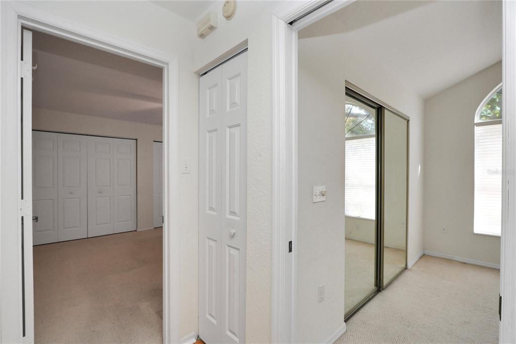 8319 Southwest 108th Loop Ocala, FL 34481 - Photo 19 of 27 a view of an empty room with windows and closet