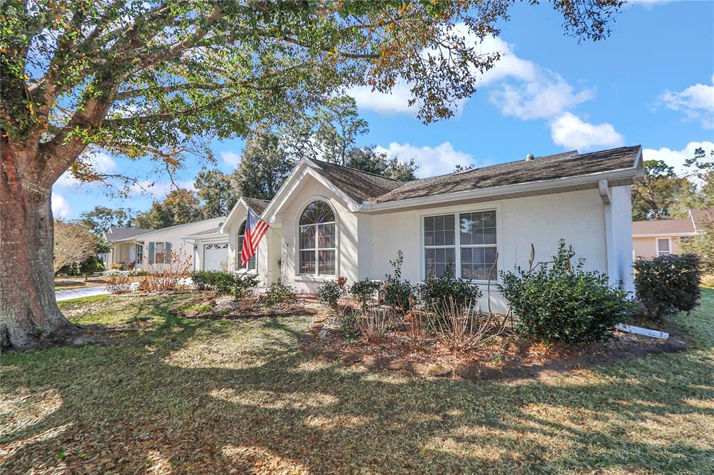 8319 Southwest 108th Loop Ocala, FL 34481 - Photo 2 of 27 a view of house with outdoor space