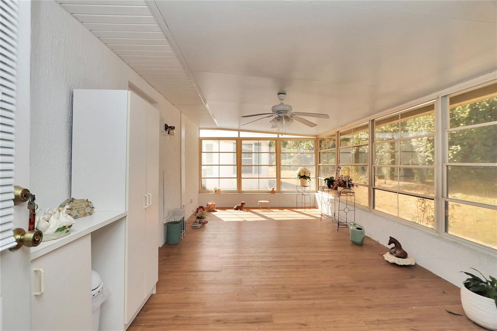 8319 Southwest 108th Loop Ocala, FL 34481 - Photo 21 of 27 a view of an empty room and window