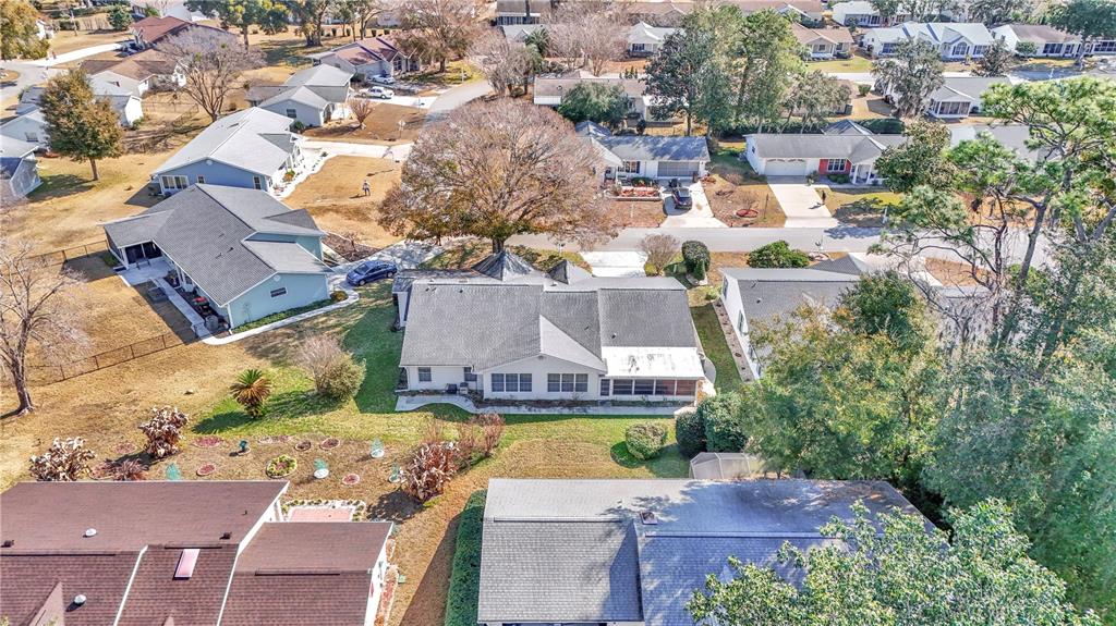 8319 Southwest 108th Loop Ocala, FL 34481 - Photo 27 of 27 an aerial view of residential houses with outdoor space