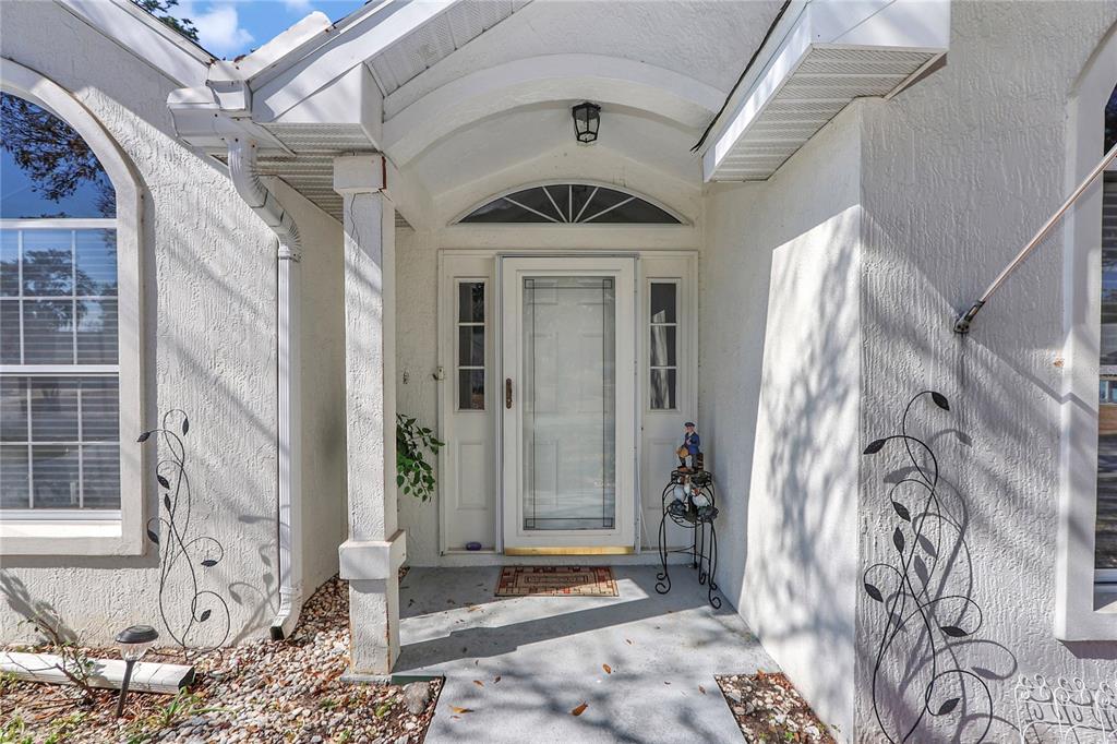 8319 Southwest 108th Loop Ocala, FL 34481 - Photo 3 of 27 a view of a entryway door of the house