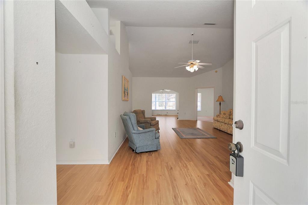 8319 Southwest 108th Loop Ocala, FL 34481 - Photo 4 of 27 a very nice looking room with a large window