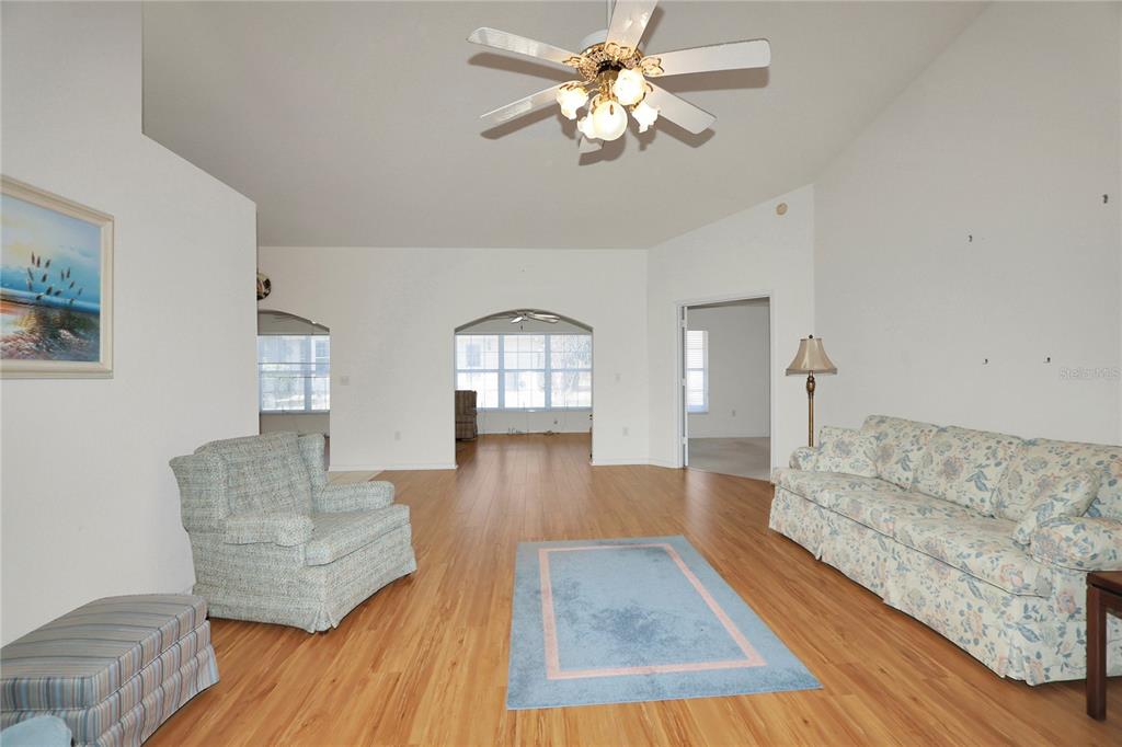 8319 Southwest 108th Loop Ocala, FL 34481 - Photo 6 of 27 a living room with furniture and a couch