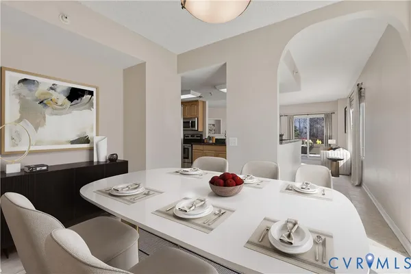 a dining room with furniture and window