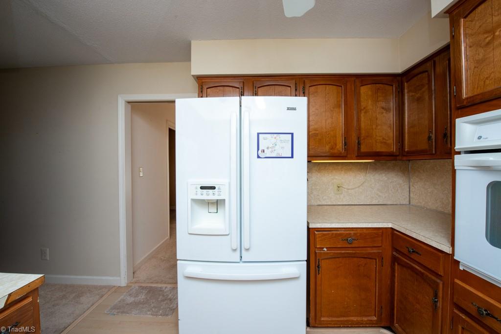 510 Gatewood Avenue High Point, NC 27262 - Photo 16 of 46 Kitchen features newer refrigerator (remains)