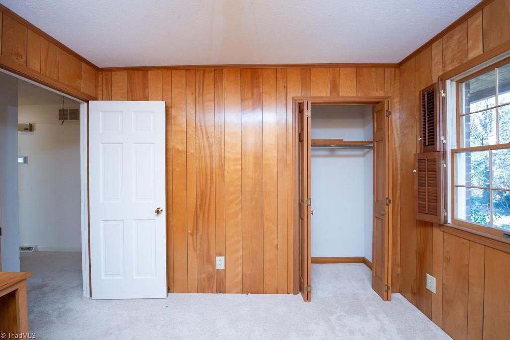 510 Gatewood Avenue High Point, NC 27262 - Photo 41 of 46 Third bedroom has paneling and built in furniture