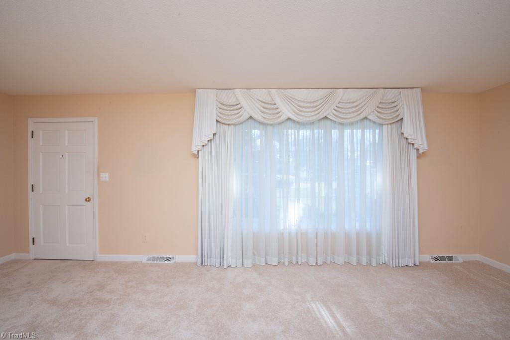 510 Gatewood Avenue High Point, NC 27262 - Photo 8 of 46 Enter the home through the front door into the living room