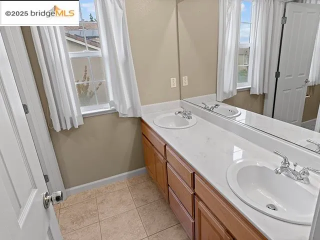 a bathroom with a toilet and a bathtub