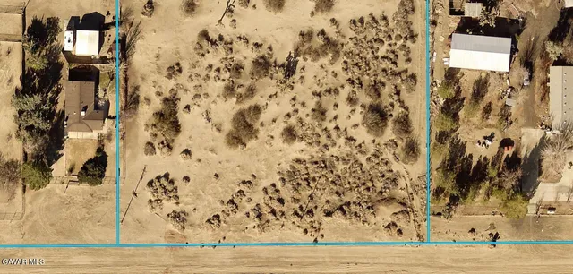 a view of a livingroom with wooden floor