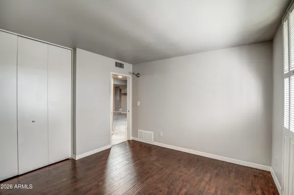a kitchen with stainless steel appliances a refrigerator sink and cabinets