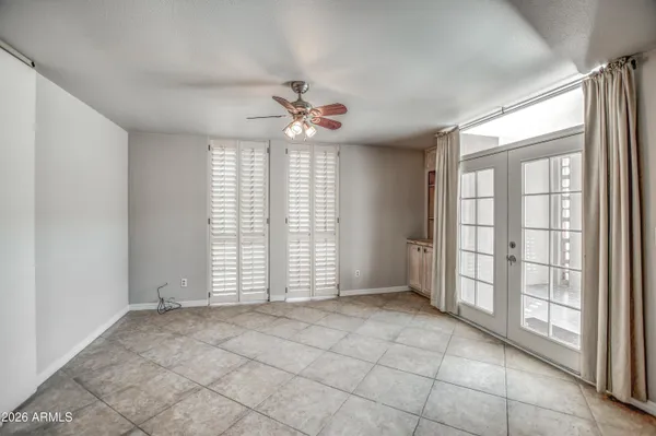 a view of an empty room with a window
