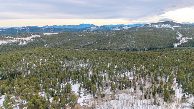 a view of an outdoor space and mountain view