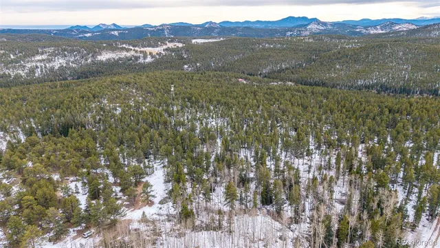 a view of lake with mountain