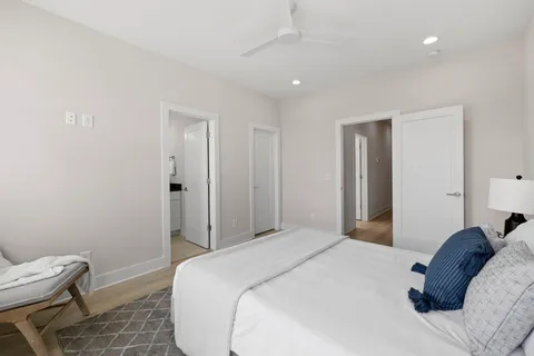 a bathroom with a bathtub and a toilet