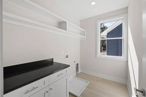 a workspace with furniture and a window