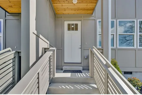 a view of a house with swimming pool