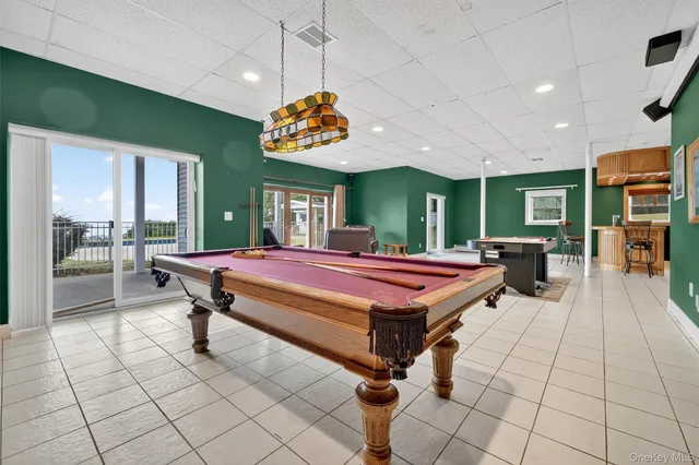 a room with lots of table and chairs