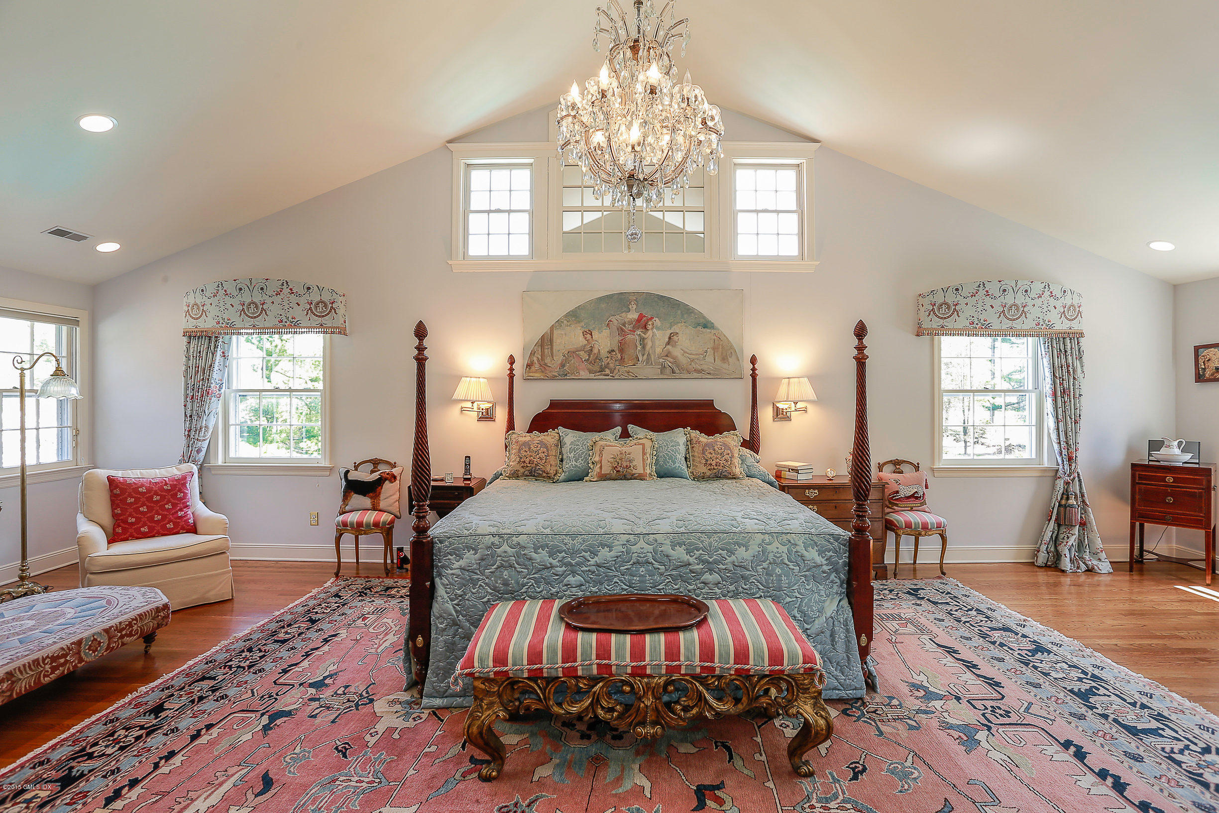 33 Doubling Road Greenwich, CT 06830 - Photo 13 of 45 a bed sitting in a spacious bedroom next to a window