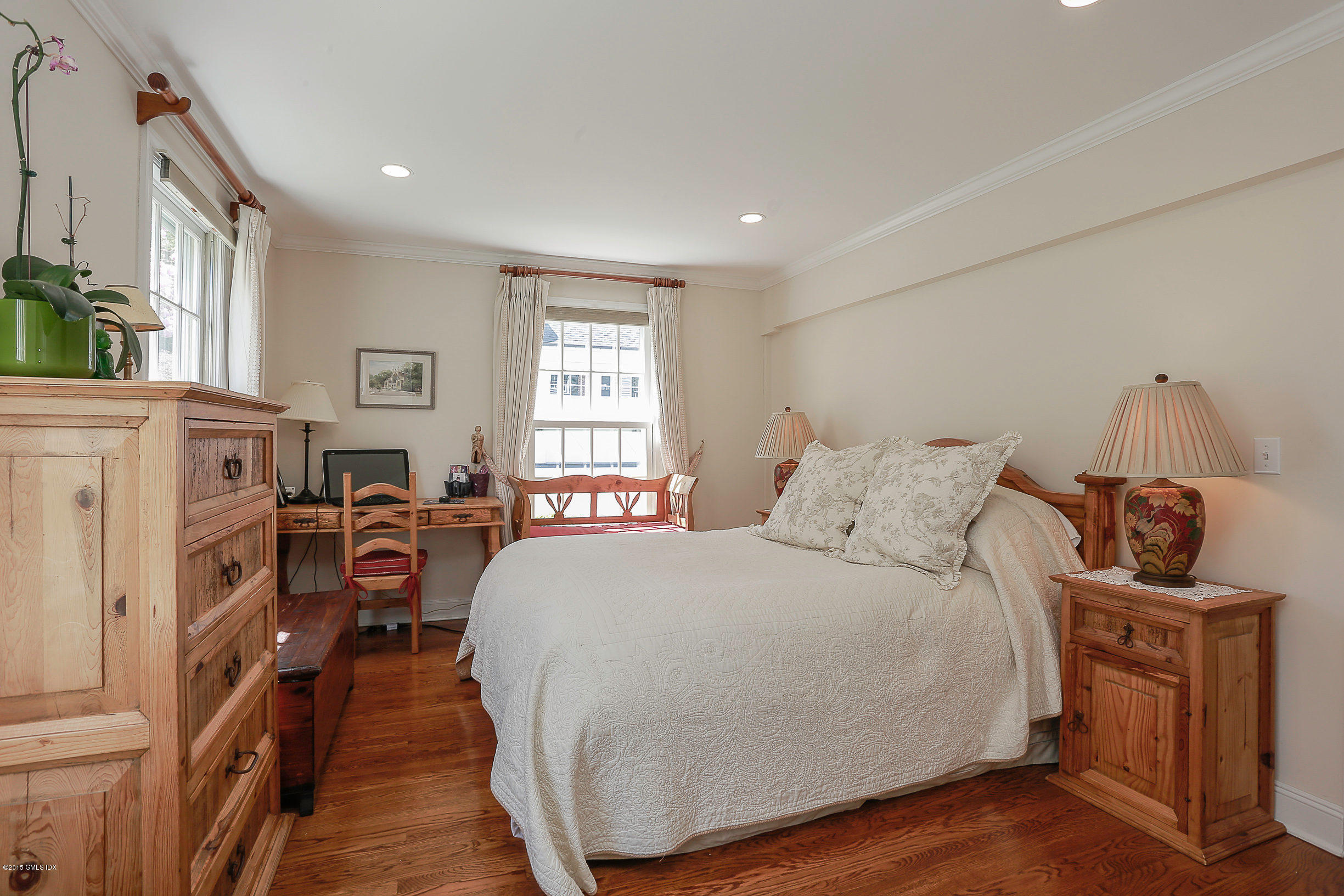 33 Doubling Road Greenwich, CT 06830 - Photo 27 of 45 a bedroom with a bed and a window