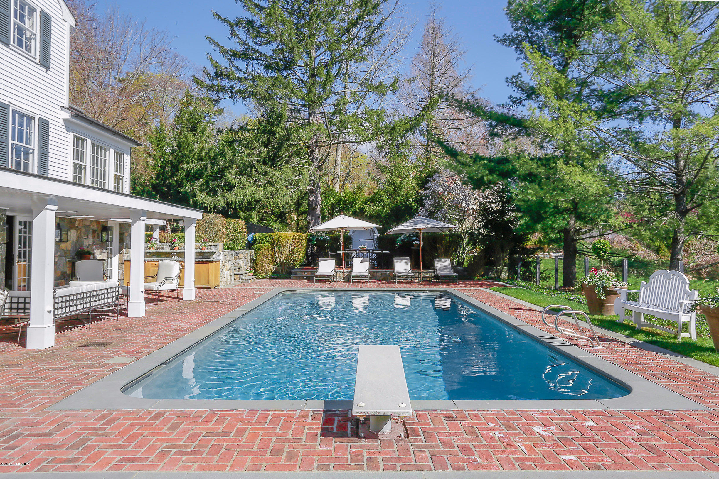 33 Doubling Road Greenwich, CT 06830 - Photo 33 of 45 a view of a house with pool