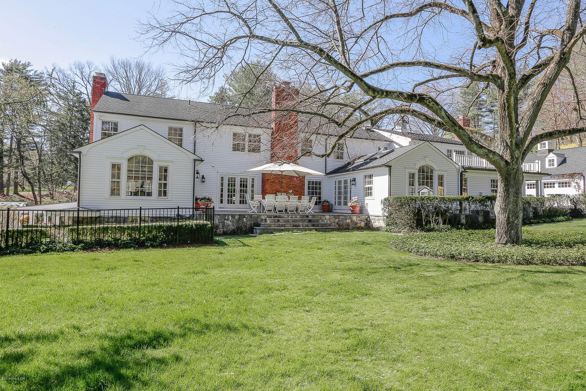 33 Doubling Road Greenwich, CT 06830 - Photo 41 of 45 a front view of a house with garden